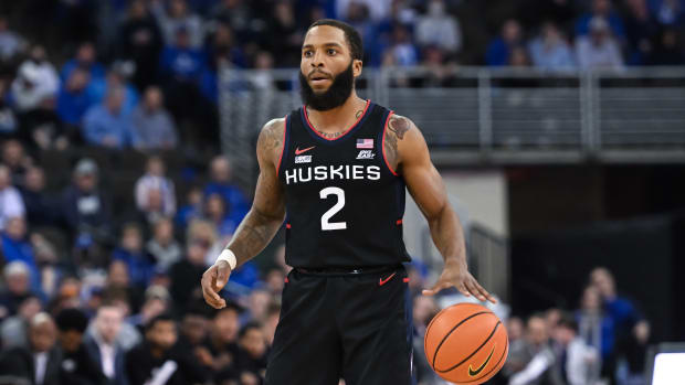 Connecticut Huskies guard R.J. Cole (2) dribbles against the Creighton Bluejays in the first half at CHI Health Center Omaha.